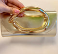 Cartera dorada asas