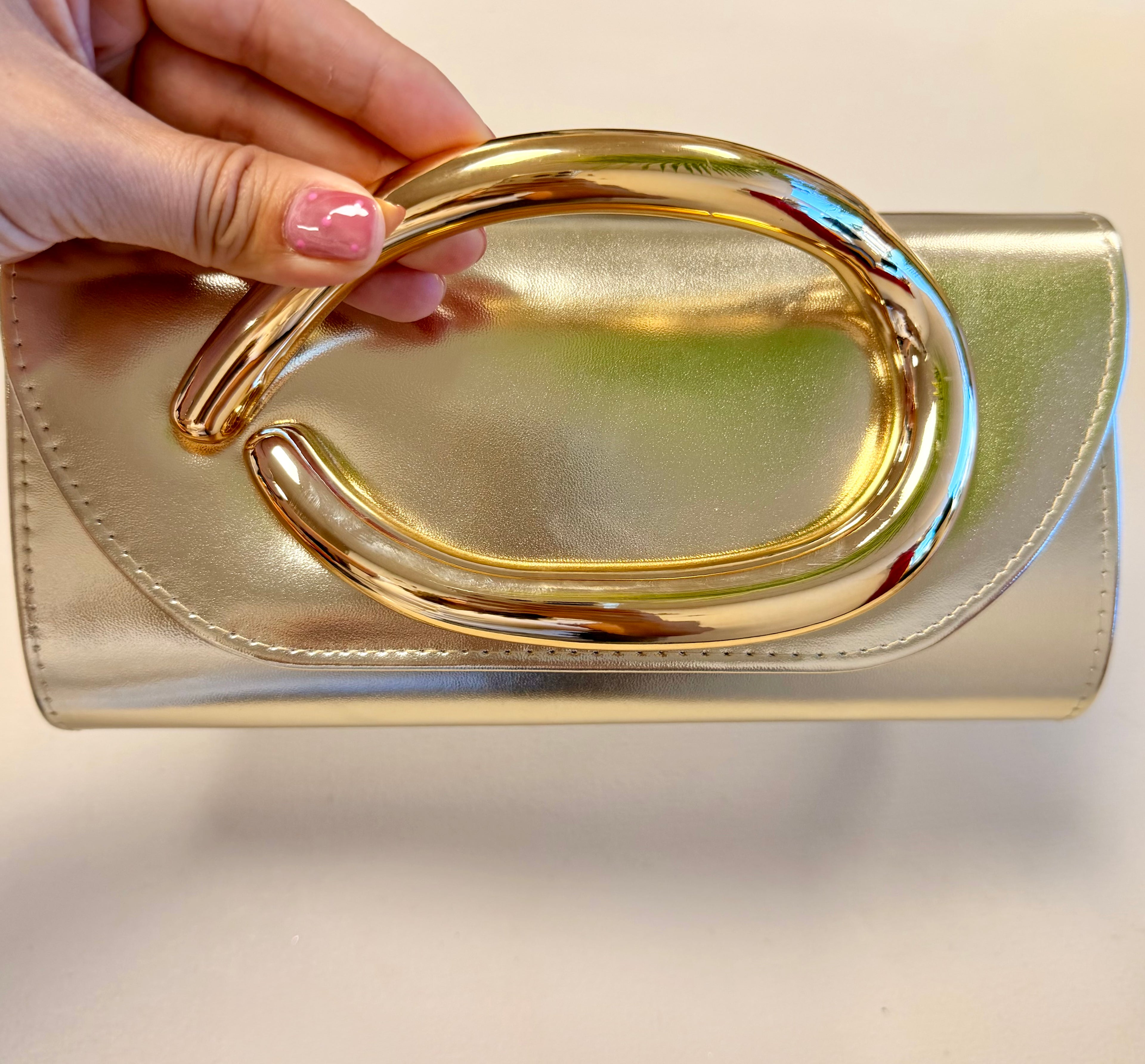 Cartera dorada asas